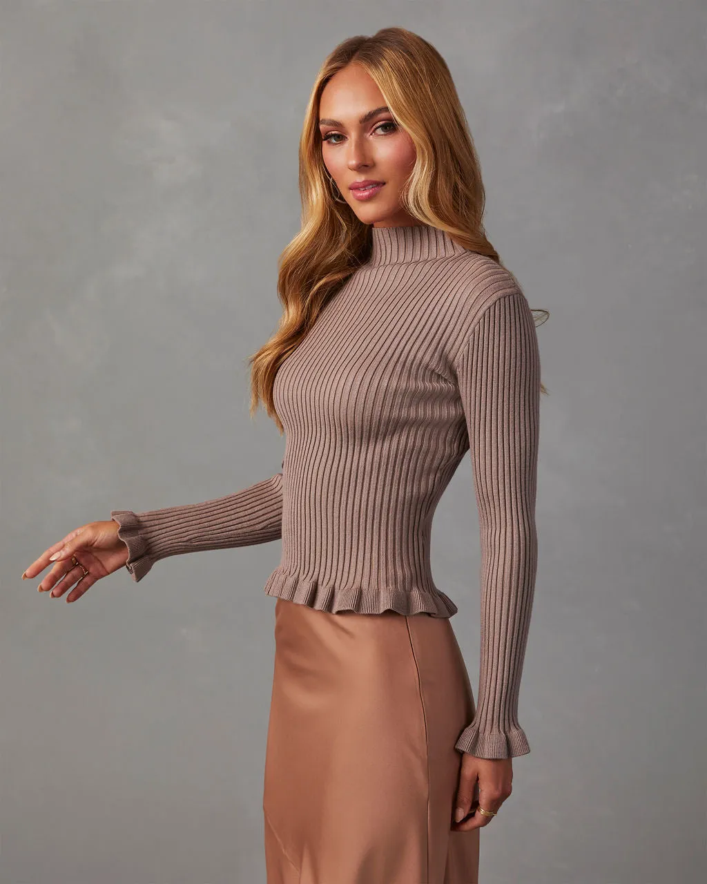Bevelle Mock Neck Ruffle Hem Sweater